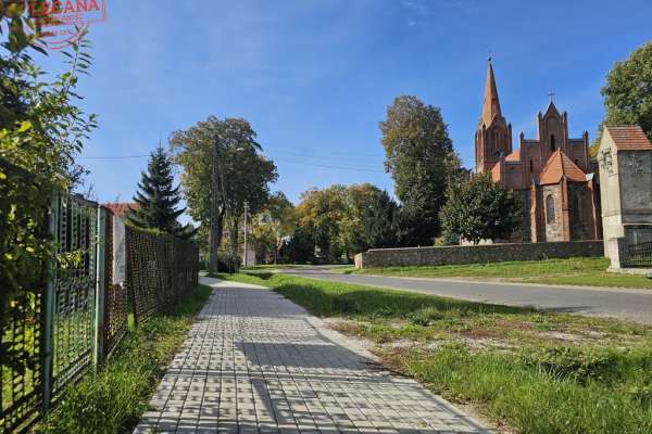 1/2 domu w Racławiu, garaż i 9,5 ar działki